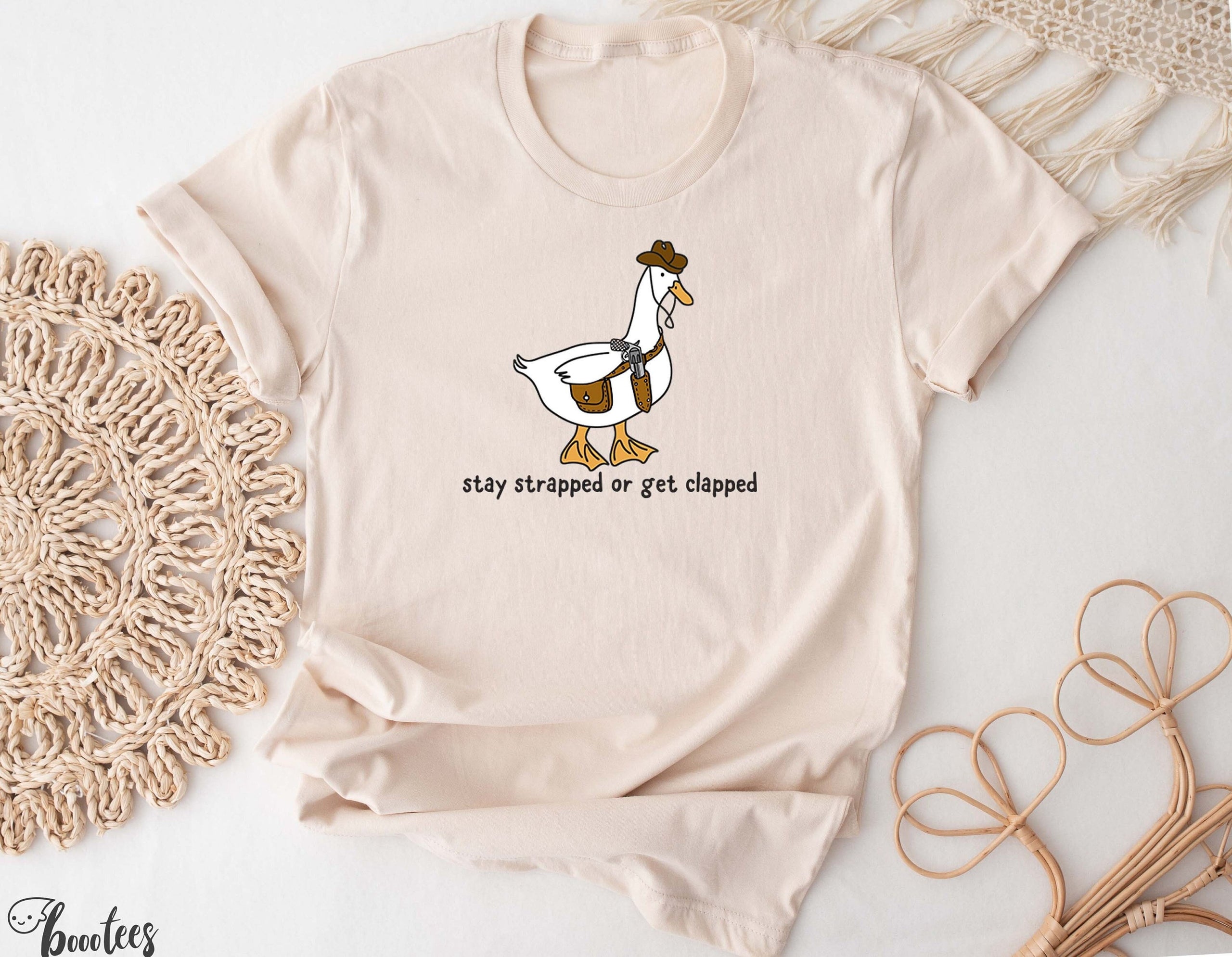 Stay Strapped or Get Clapped Shirt Cowboy Goose T shirt Funny Cute T shirt Gift Idea Wild West Tshirt Animal Country Western Lover T Graphic Tee – Warm & Stylish · Must-Have Style